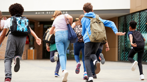 children running to school